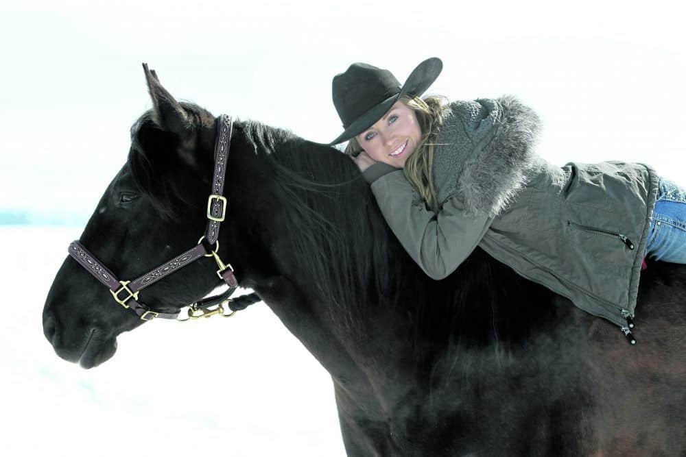 Amber Marshall riding her horse. 