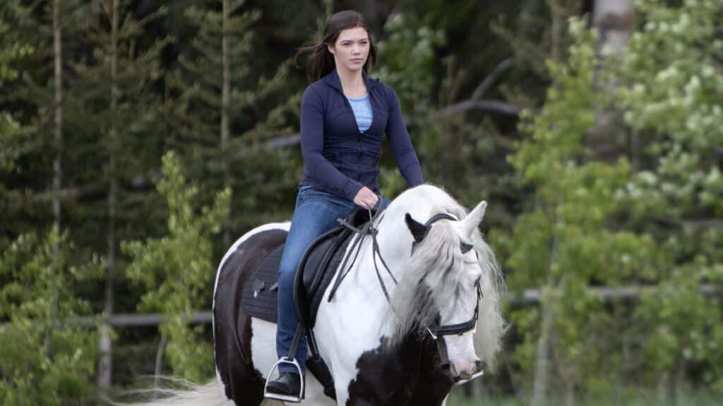 Georgie riding a horse. 