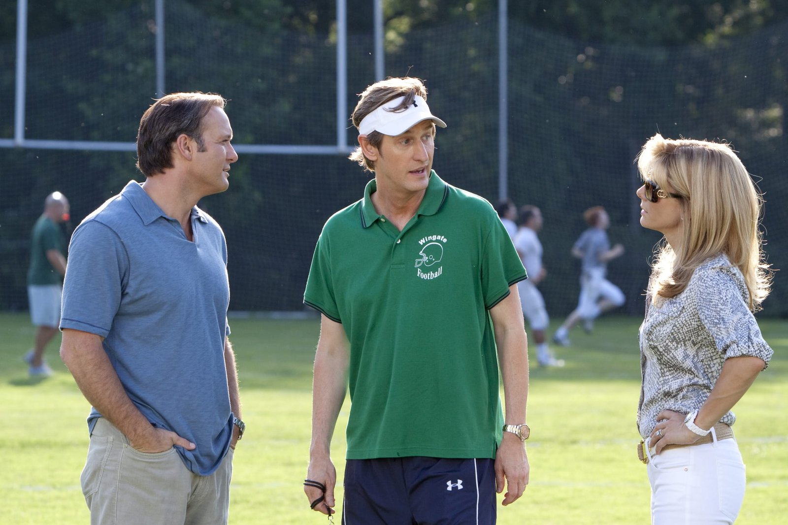 Tim McGraw, Ray McKinnon, and Sandra Bullock in The Blind Side (2009)